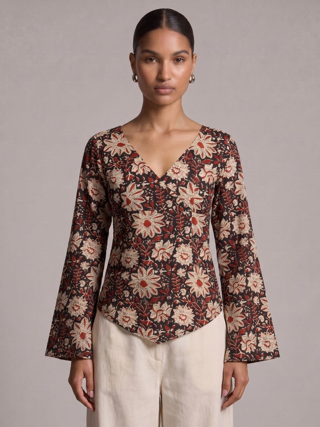 Naira Bell Sleeved Structured Top